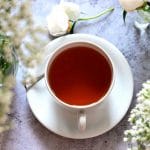 bergamot tea with flowers in the background