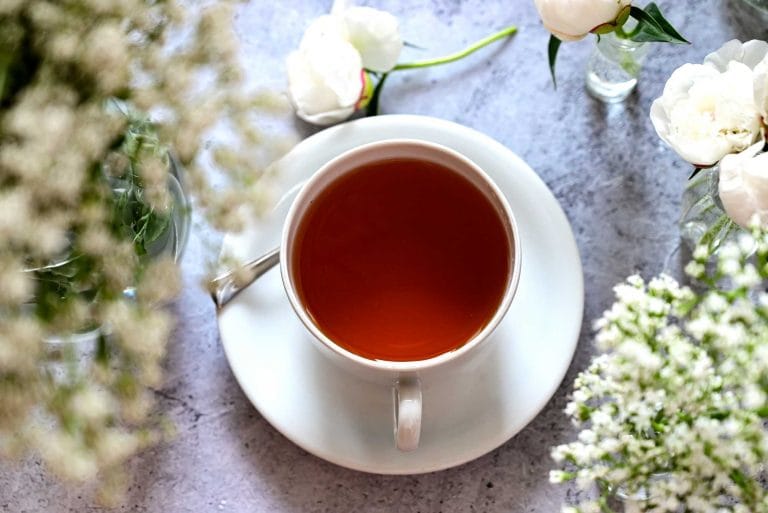 bergamot tea with flowers in the background